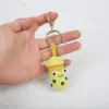 Porte-clés tasse à thé au lait jaune en crochet