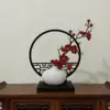 Horizontal screen, small white teapot, red plum blossom