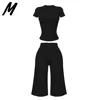 Completo Nero con Maglietta a Maniche Corte e Pantaloni Capri