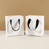 White Bag and Black String
