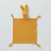 Copertina coccolosa coniglietto arancione-giallo.