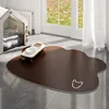 Tapis pour animaux de compagnie en cuir double face - tête de chien minimaliste marron