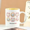 Yellow-colored healing bear head smiley face cup