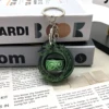 Llavero Cabeza de Dragón - Seda Negra y Verde