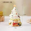 White Christmas tree with a bear