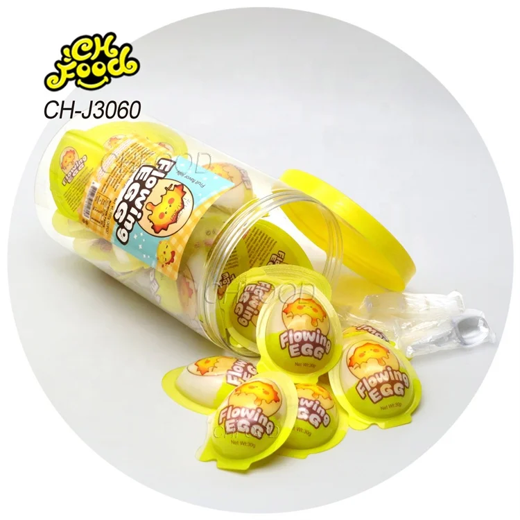 Wholesale New Hot Fruity Flowing Egg Jelly Pudding OEM Egg Shape Jelly Pudding Filled with Fruit Flavor Liquid Candy Sweet Snack