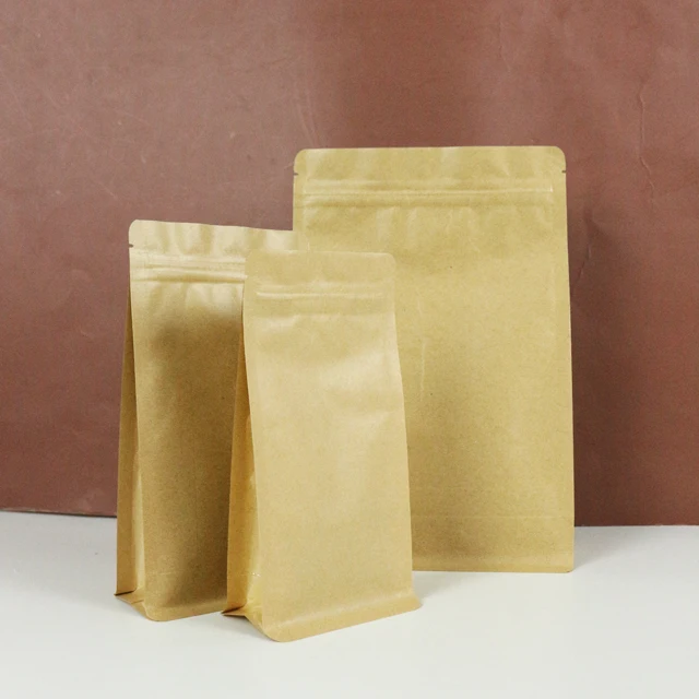 OEM Design Gravure Printed Matte Coffee Kraft Flat Bottom Paper Bag with One Way Valve for Pet Food and Potato Chips