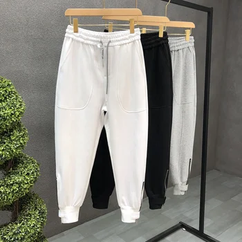 High-end trousers for boys, ins trend, versatile white nine-point pants, autumn men's handsome casual solid color sports pants