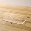 Stacked storage box divided into compartments