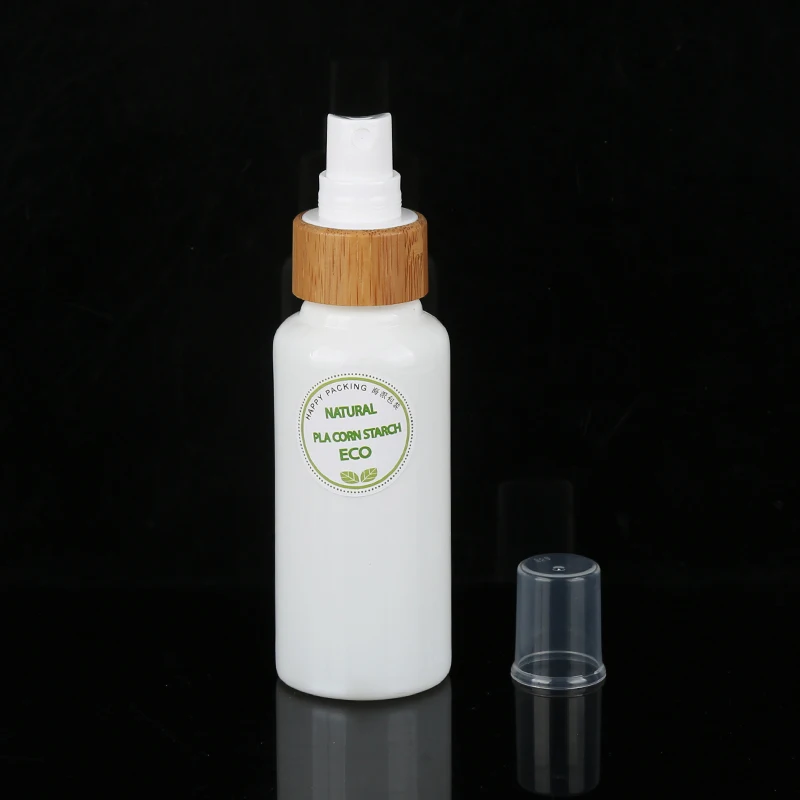 Natural 50ml 100ml PLA Material Polylactic Acid Biodegradable Lotion Bottle with Bamboo Cover for Shampoo