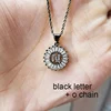 Black letter with O chain