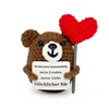 Little bear hugs a heart