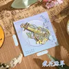 Flying blossoms and dappled jade-ancient style guitar bookmark