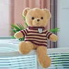 Maglione marrone chiaro + strisce rosse