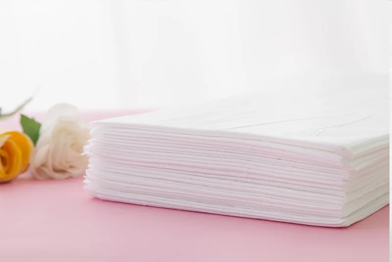 Ткань одноразового использования белый одноразовые простыни для похода в спа-салон массаж лист