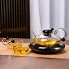 Teiera trasparente con fornello e 2 tazze