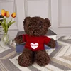 Maglione bordeaux orso nero