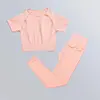 Maglia rosa a maniche corte+leggings