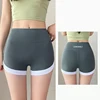 Pantalones de yoga con diseño patchwork verde.