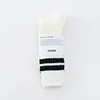 White with black stripe