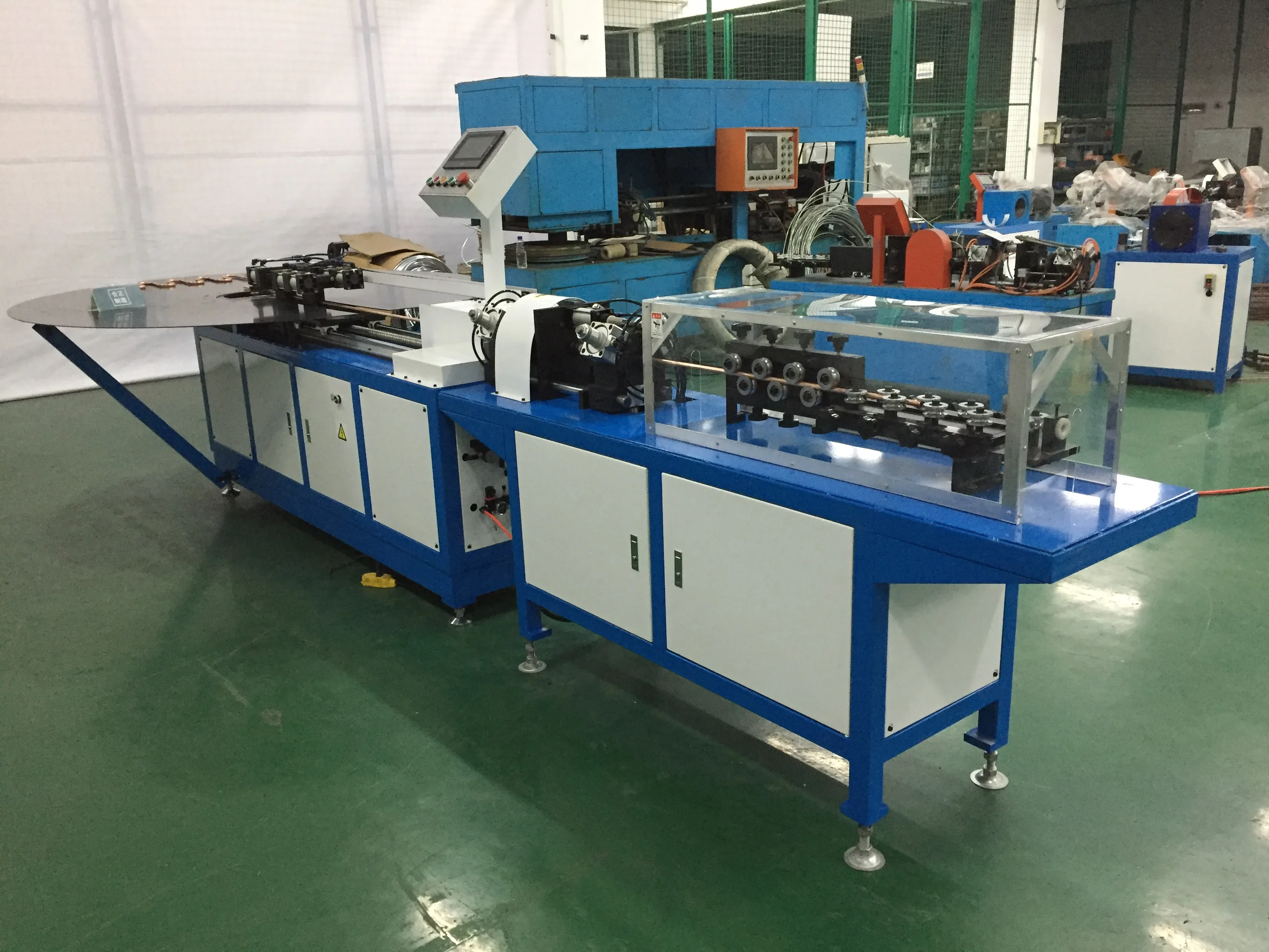 BOBO Machine automatic pipe tube straightening bending serpentine and cutting shown in a detail photo for this news article