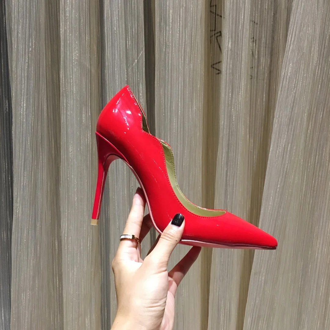 red bottom heels designer