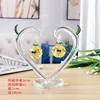 2 coeurs suspendus jaunes