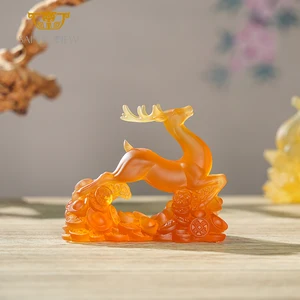 Handcrafted Amber Crystal Glass Liuli Deer Figurine Cast by Ancient Lost Wax Technique with Sycee Ingots Symbolizing Wealth