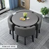 Mesa redonda gris + silla de cuero gris oscuro