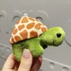 Plush turtle - silver chain with dots of green and brown spots