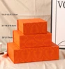 Burnt Orange with Damask Pattern