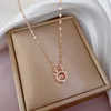J218 collar de acero titanio colgante de cobre