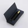 frosted amber bottle + gold sprayer + black box