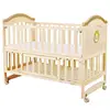 Lit bébé en bois massif