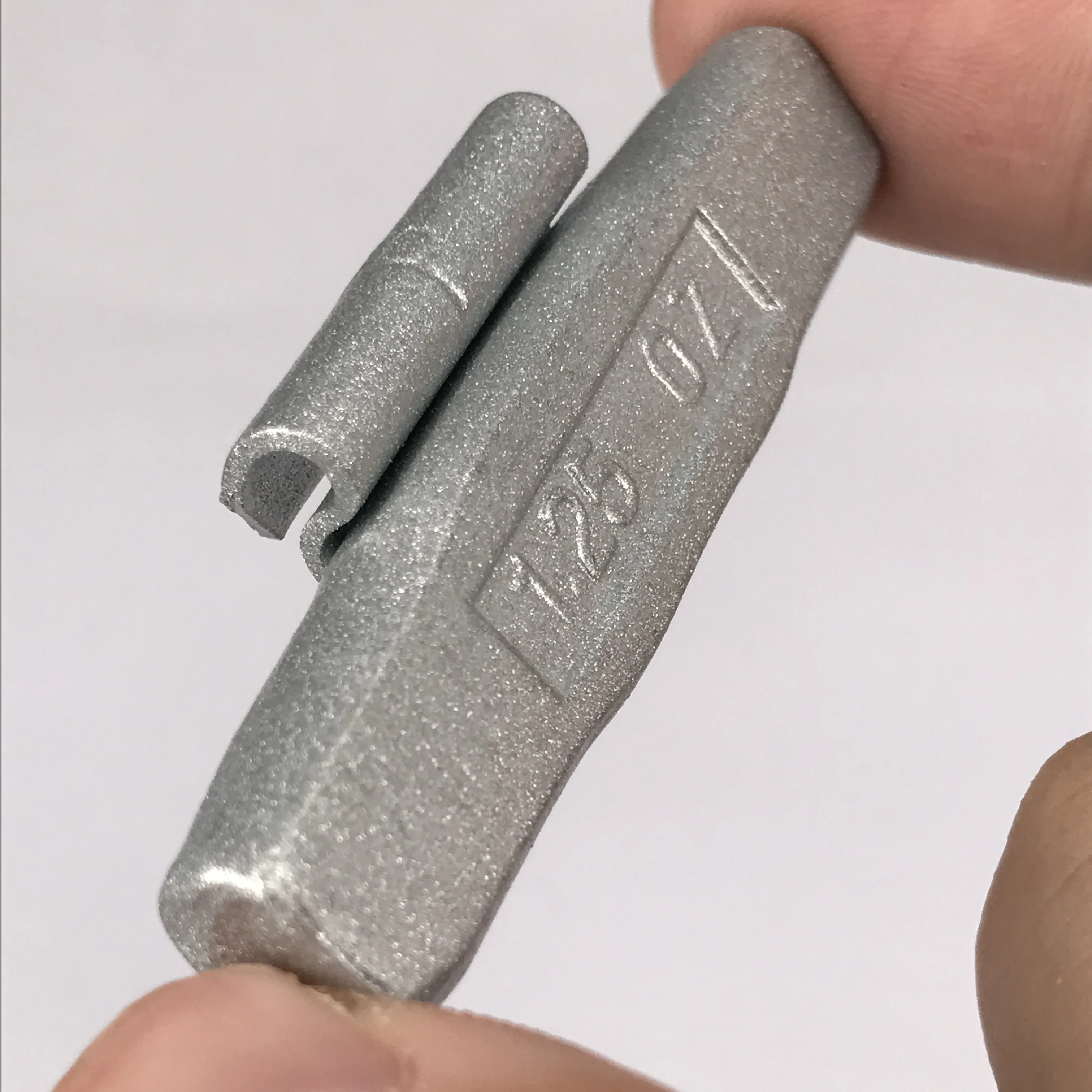 thumbnail image 2 of A2Z TIRE SUPPLIES MC Series Hammer On ZINC Wheel Weights Coated (0.50 Oz) Box Of 100 Pcs 2 of 14