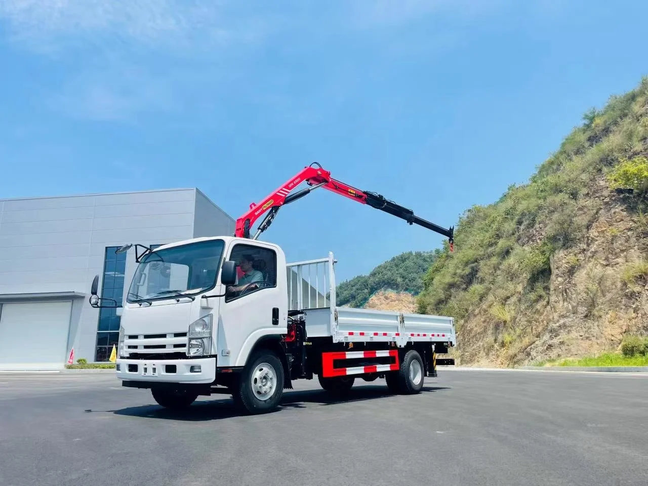 China Isuzu Npr 700p 4x2 Palfinger Crane Truck Max Height 10 Meter 3.2 Tons Lift Weight Trucks