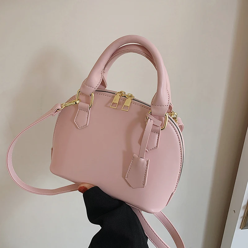 Wholesale High quality shell shape solid color women crossbody bag sling bag  with zipper and handle wholesale multi colors for choice From m.