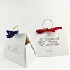 Folding gift bag with wooden handle