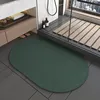 New generation of diatomaceous earth bathroom mats - natural oval dark green
