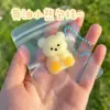 Ours en peluche moelleux - sachet individuel en PVC
