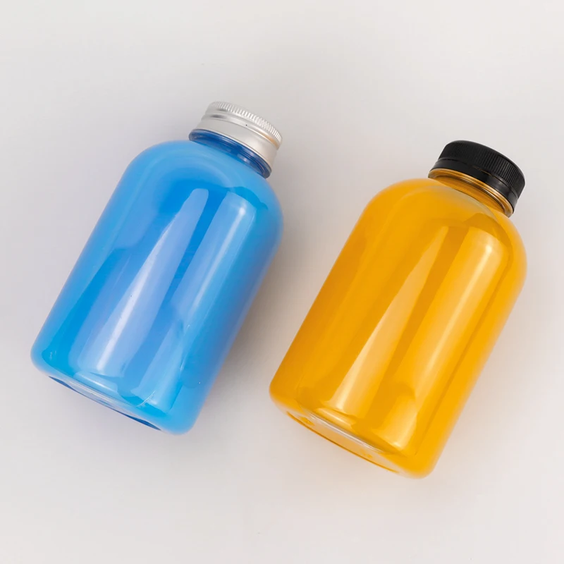 Custom 150ml 200ml 250ml 300ml 320ml 500ml Biodegradable  PET Plastic Fruit Juice Beverage Bottles for Packaging