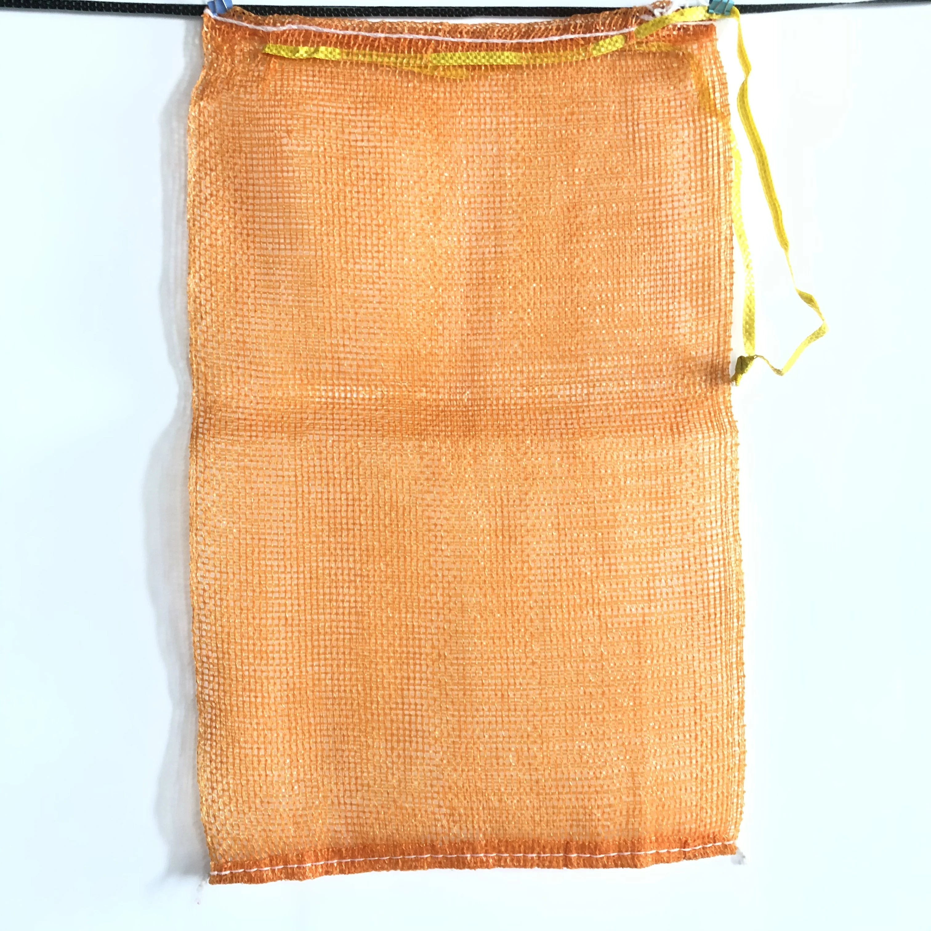 China Manufacturer Pp Knitted Packaging Onions Leno Mesh Net Bag for Fruit Vegetable Firewood