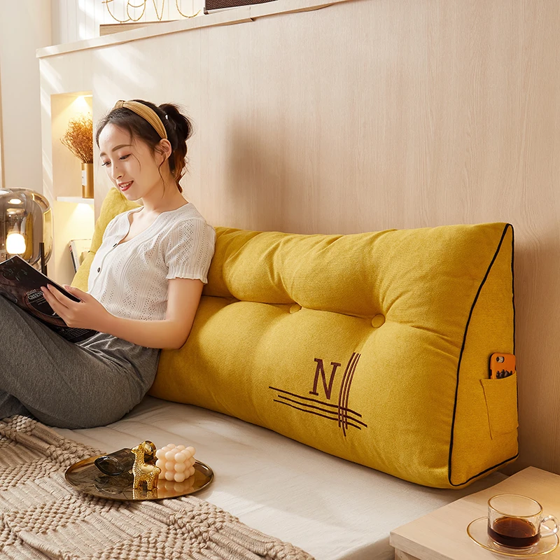 yellow backrest pillow