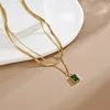 collana in oro-17 con diamanti verdi