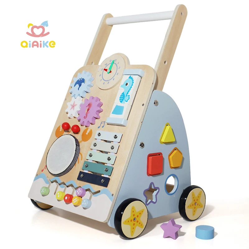多機能8-in-1学習用プッシュカート（赤ちゃん用アクティビティウォーカーおもちゃ）。形合わせパネル・音楽パネル・収納スペース付き。運動能力の発達を促進