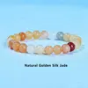 Gold silk jade