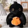 Un corvo tiene in mano una zucca - 30 cm