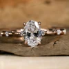anillo ovalado con piedra lateral