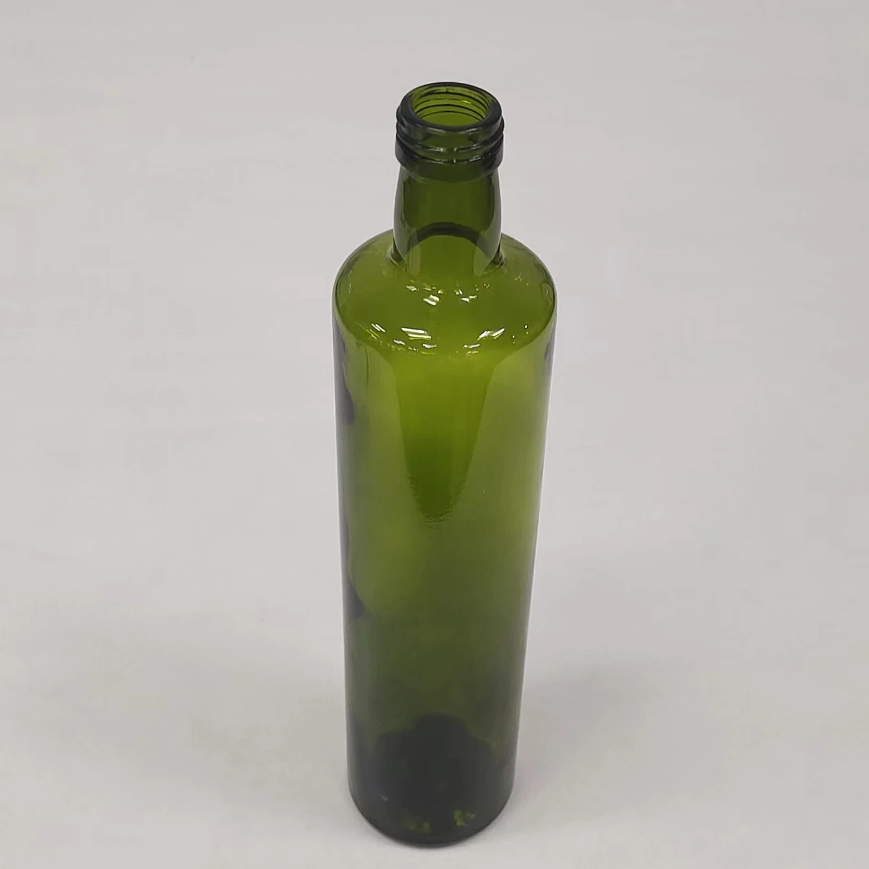 Bottiglie in vetro 1 litro, 1000 ml, vetro trasparente quadrato per olio da  cucina Bottiglia di olio d'oliva con coperchio a vite - Cina Bottiglia di  vetro e bottiglia di vetro con