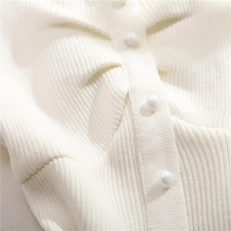 2021 Korean Version of Nice temperament vest knitted sweater is sexy girl style with middle row and button straps